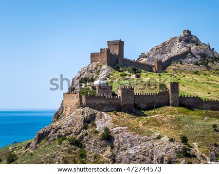 Ancient Genoese fortress in the city of Sudak, Crimea, Russia Royalty-Free Stock Photo #472744573
