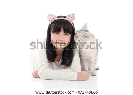 Cute kitten kissing Asian girl on white background isolated