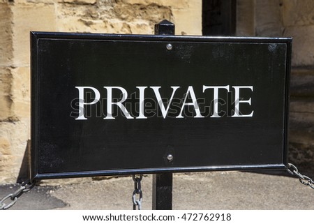 A black private sign.