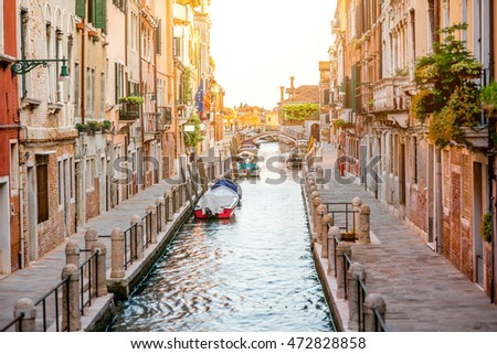Small romantic water canal in Dorsoduro region in Venice Royalty-Free Stock Photo #472828858
