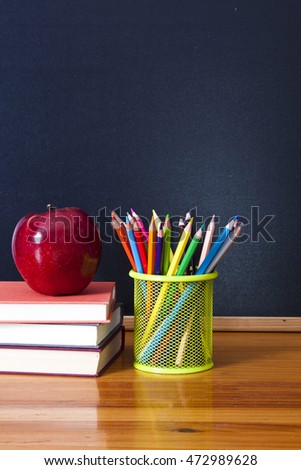 school supplies with chalkboard, back to school concept