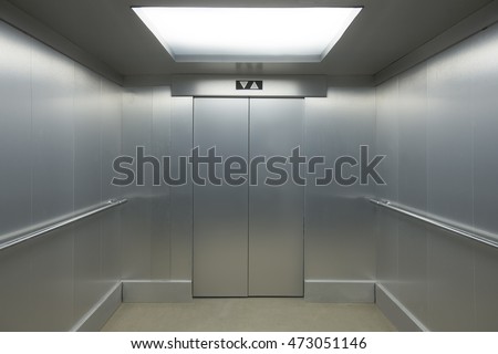 Interior view of a modern elevator Royalty-Free Stock Photo #473051146