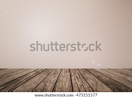 old vintage grungy brown wood tabletop with blurred light sepia colored background for show your products on this display.