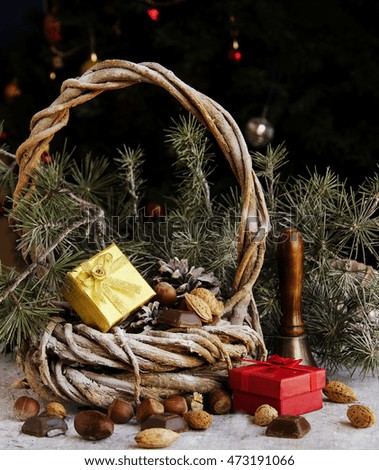 Christmas card with fir branches, tangerines, pine cones, and decoration elements , selective focus