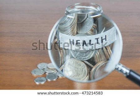 Coins in  a glass bottle(saving concept)