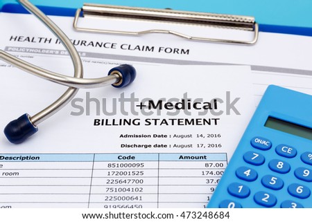 Health care cost concept with calculator and medical bill