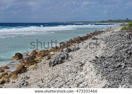Sea shore on the entry of the Tiputa pass, atoll of Rangiroa, Tuamotu archipelago, French Polynesia, Pacific ocean