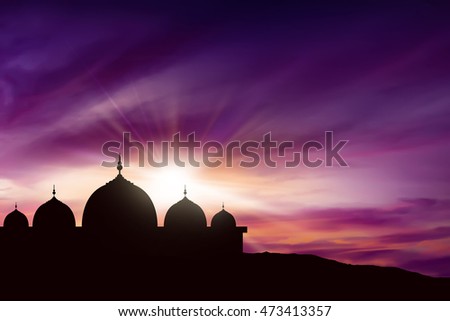 Silhouette mosque picture and twilight background.you can put your design to make giftcards