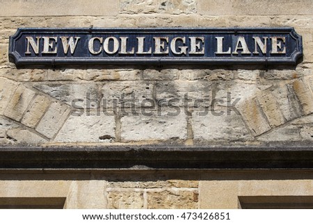 Street sign for New College Lane in the historic university city of Oxford, England.