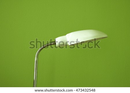 White Lamp on green background