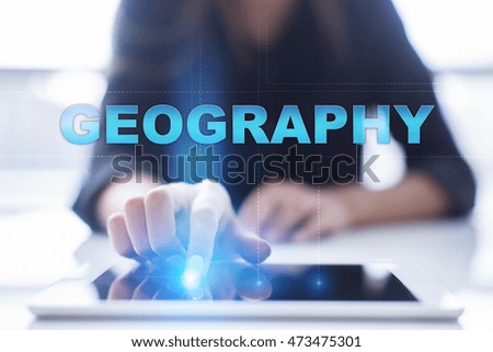 Woman is using tablet pc, pressing on virtual screen and select "Geography".