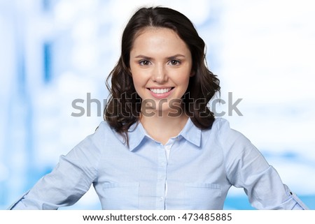 Portrait of a young happy smiling woman