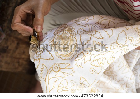 Making Batik in Indonesia Royalty-Free Stock Photo #473522854