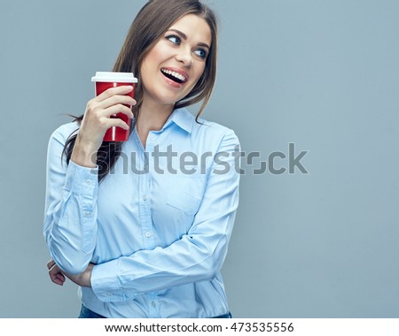 Smiling business woman holding red coffee glass. Break at work. Studio isolated.