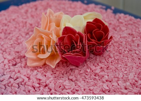 spa roses  wth stones