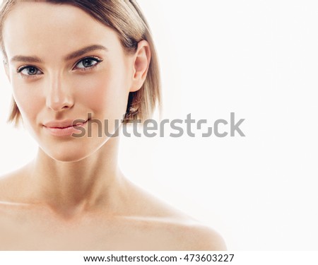 Beauty Spa Woman with perfect face skin Portrait. Beautiful Blonde brunette Spa Girl showing empty copy space  for text. Proposing a product. Gesture for advertisement. Isolated on white