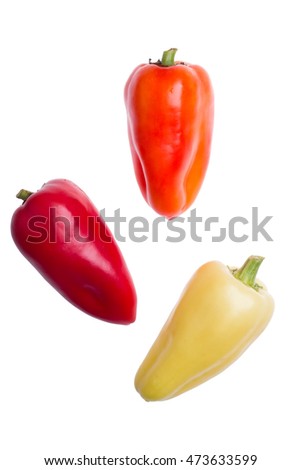 three sweet peppers on a white background isolated top view Royalty-Free Stock Photo #473633599