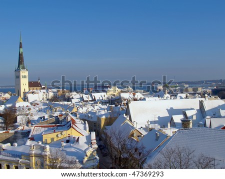 Fresh snow on roofs of old Tallinn Royalty-Free Stock Photo #47369293