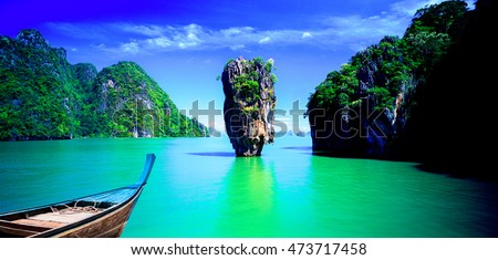 Gorgeous scene in Tapu island.The beach and fishing boats.James Bond Island Phangnga Thailand. Royalty-Free Stock Photo #473717458