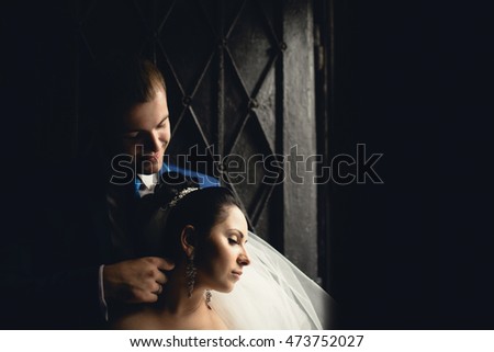 love man  hugs his beloved wife