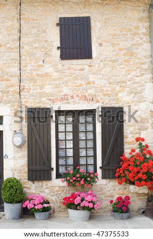 Cuisiat (Ain, Rhone-Alpes, France) - House in the old village with flowers