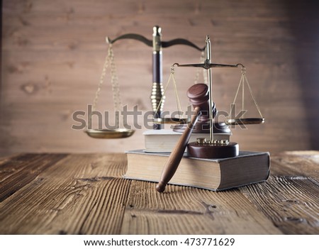Mallet, legal code and scales of justice. Law concept, studio shots
Law theme, hourglass, golden scales of justice, gavel and books on brown background