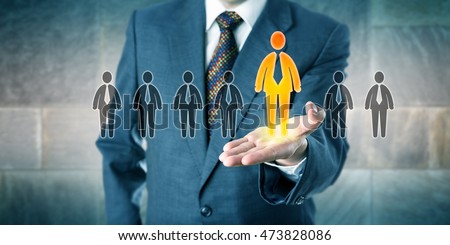Successful candidate is standing out in a lineup of seven applicants. White collar profession concept for personal career development, talent acquisition, unlocking your potential and leadership. Royalty-Free Stock Photo #473828086