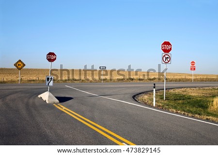 Signs on empty highway