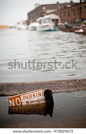 Submerged no parking sign