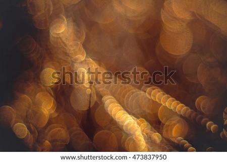 Golden streamers with sparkling glitter. Christmas holidays background
