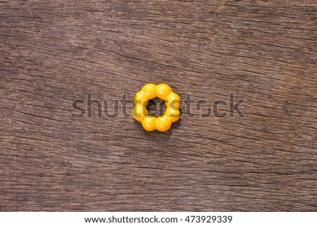 Donut on wooden background