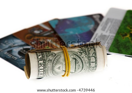 An image of roll of dollars and credit card