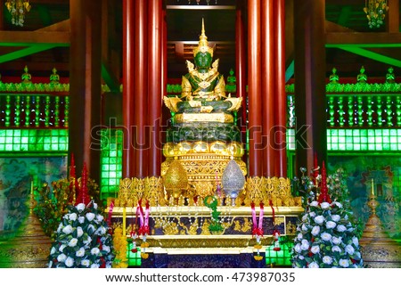 Statue of the Emerald Buddha at Wat Phra Kaew, Chiang Rai Royalty-Free Stock Photo #473987035