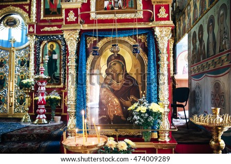Many colorful icons in the church building