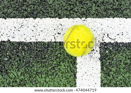 Tennis ball touches the corner line. Concept image for "IN" or score.