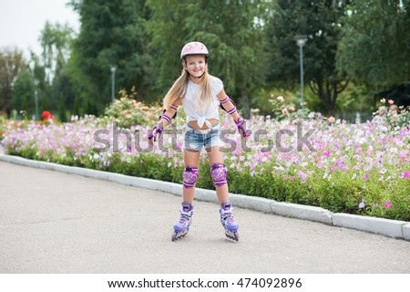 beautiful little girl on roller skates