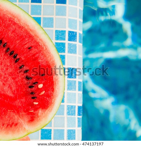 Watermelon in the blue pool.Tropical fruit diet.