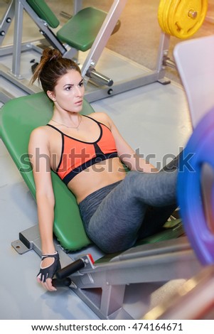 fitness girl shakes her legs  . The concept of health, sports
