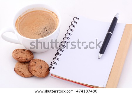 blank notebook, Cup of coffee and cookies isolated on white background. Office concept.