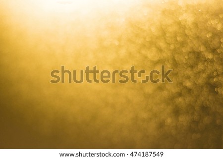  gold light particle and glitter bokeh.