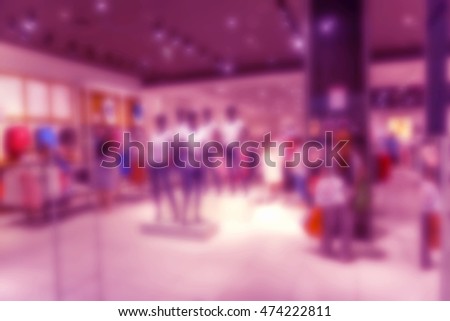 Blur urban marketplaces store during the final seasonal sale of fashion goods. Shopping hall supermarket as a universal background blur for any theme of design sales