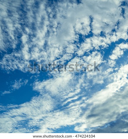 Bright Blue Sky and Clouds background