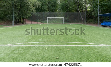Small empty soccer field with goal post and marking
 Royalty-Free Stock Photo #474225871