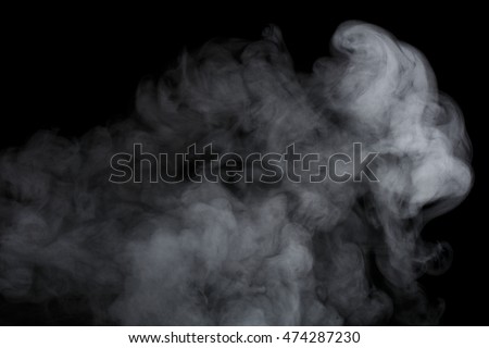 Abstract white water vapor on a black background. Texture. Design elements. Abstract art. Steam the humidifier. Macro shot. Royalty-Free Stock Photo #474287230