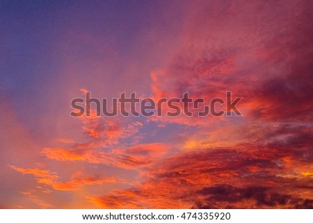 Beautiful sunset / sunrise sky with clouds.Image contain certain grain or noise and soft focus.