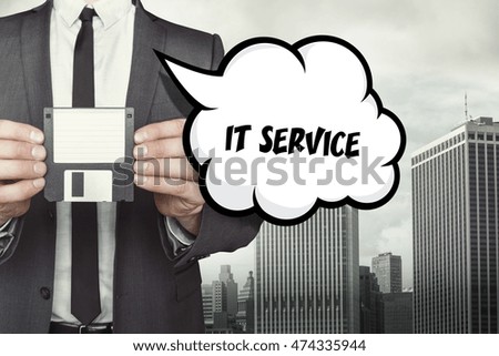 IT Service text on speech bubble with businessman