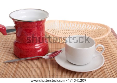 Coffee white cup  and basket on wooden table