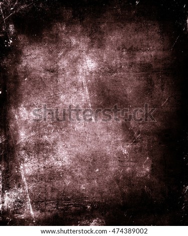 Dark Scratched Grunge Abstract Texture Background. Scary halloween poster with faded central area for your text or picture
