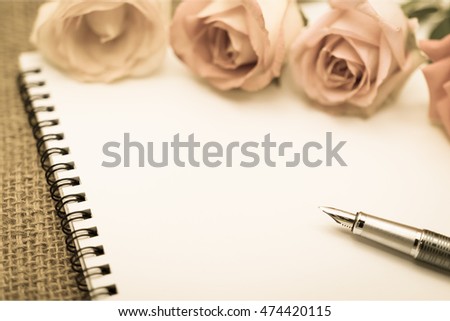 Diary note with rose on gunny bag (Organizer ,agenda, book, diary)