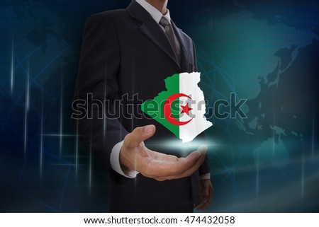 Businessman showing map of Algeria on globe background